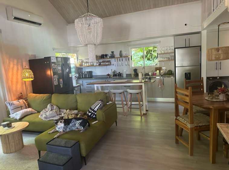 Living room and kitchen area in Casa Mia beach home for sale Costa Rica